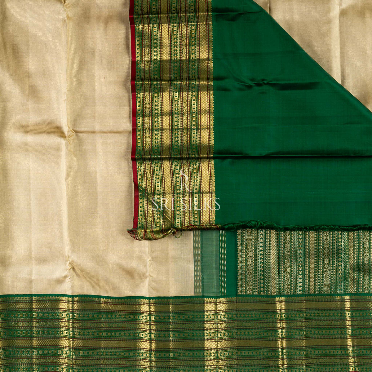 Pure Kanjivaram Silk Saree in Ivory & Emerald Green with Gold Zari  UID: SRI-KAN-2026-0812-047