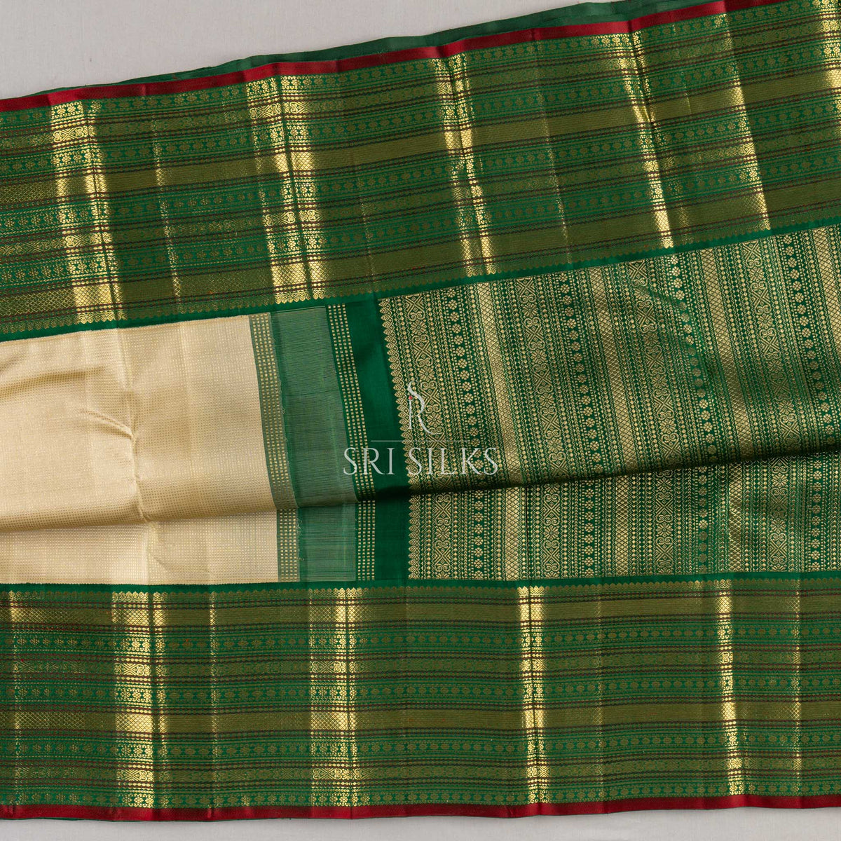Pure Kanjivaram Silk Saree in Ivory & Emerald Green with Gold Zari  UID: SRI-KAN-2026-0812-047