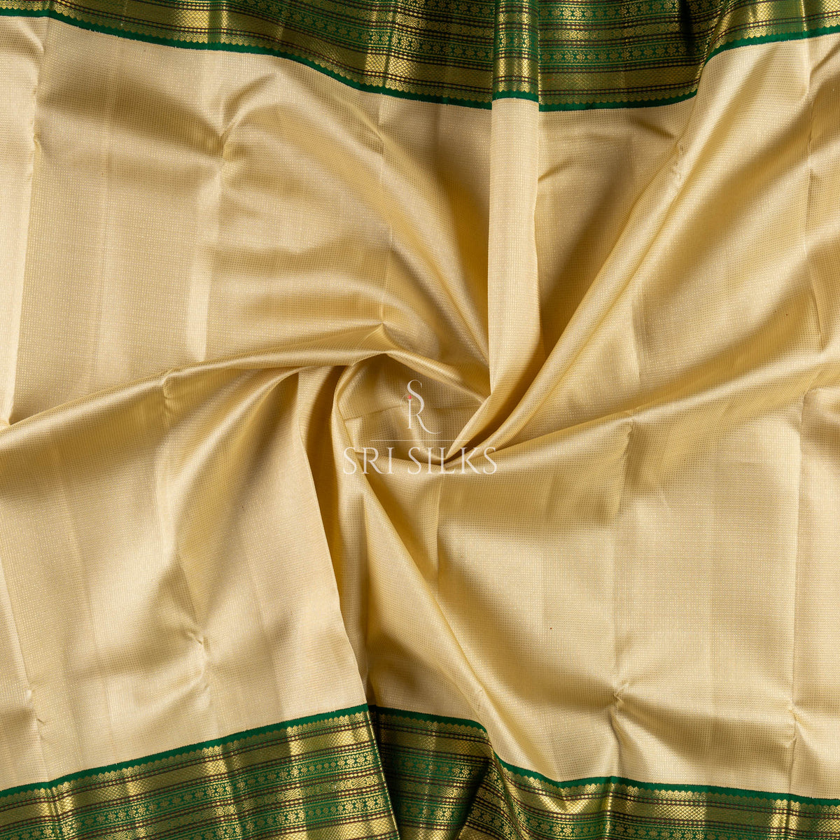 Pure Kanjivaram Silk Saree in Ivory & Emerald Green with Gold Zari  UID: SRI-KAN-2026-0812-047